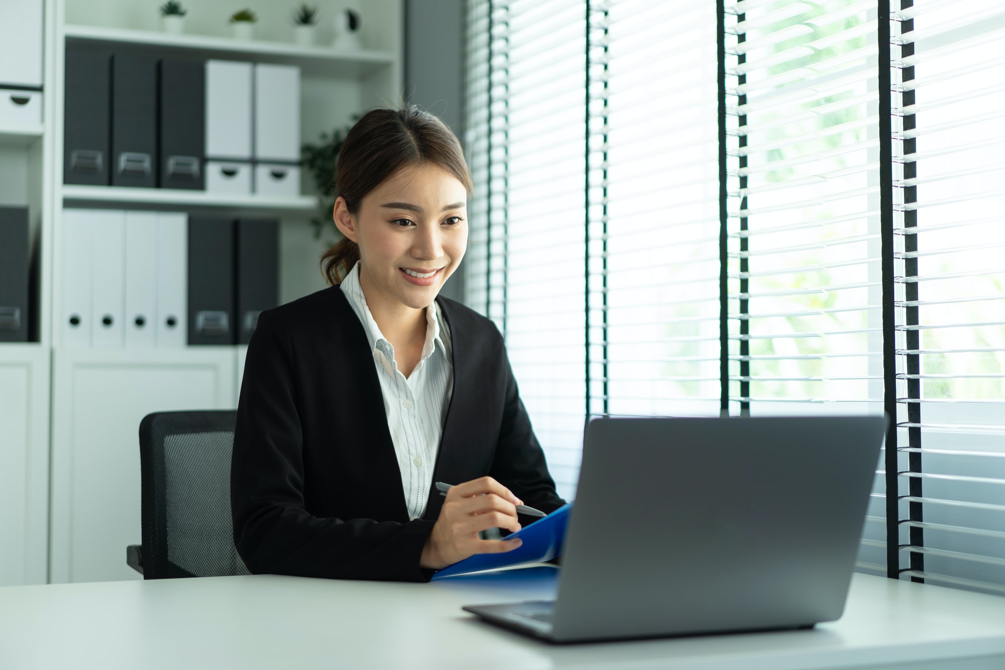 Asian beautiful woman video call with hr manager for job interview.