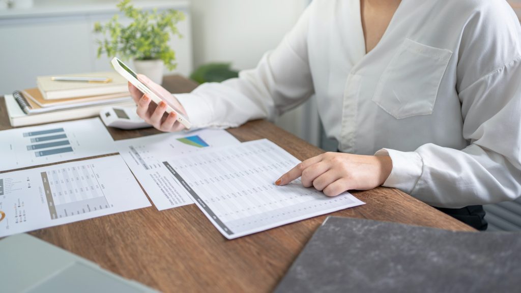 Auditor or internal revenue service staff, Business women checking annual financial statements